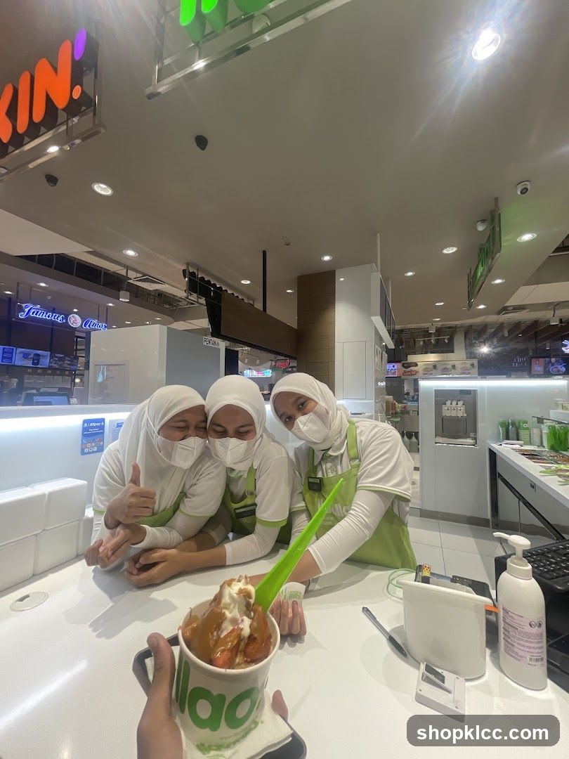 Ice Cream Shop Interior with Staff and Product