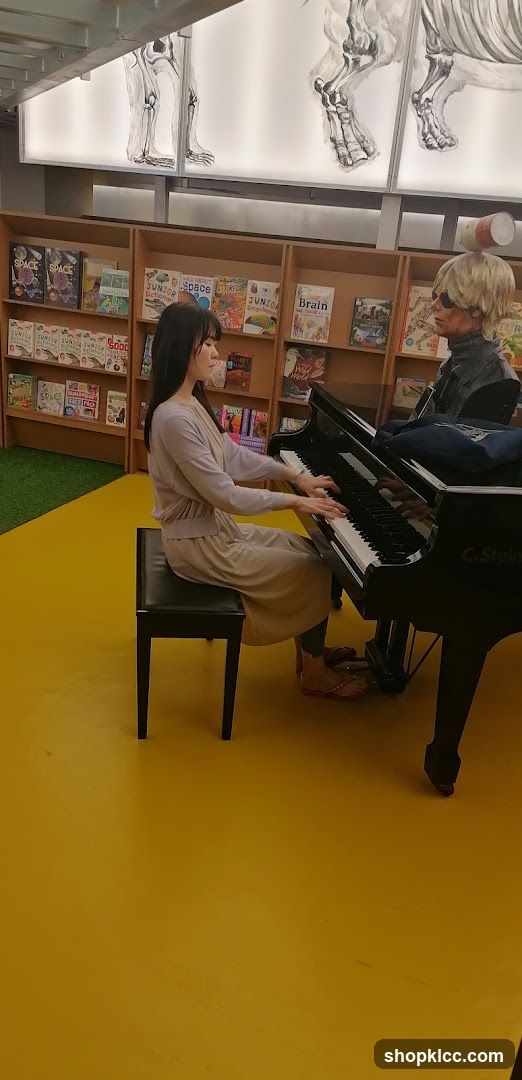 Piano Player in Library