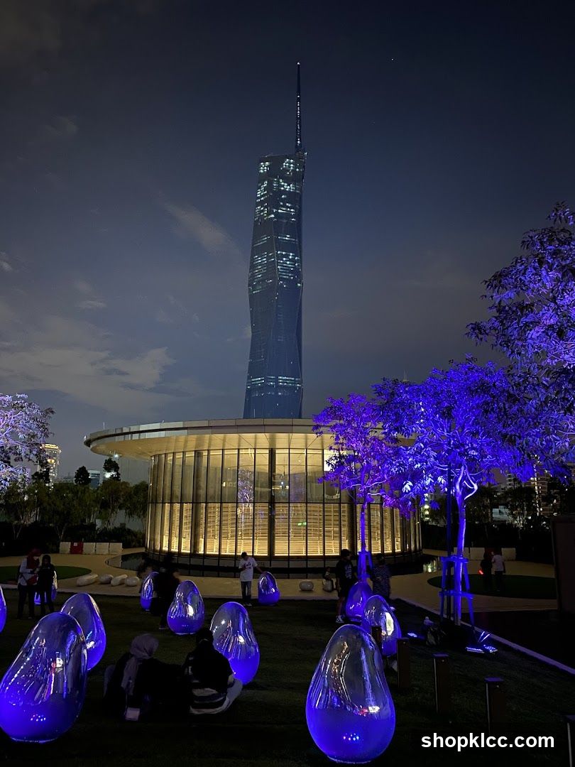Night View of Skyscraper and Illuminated Trees