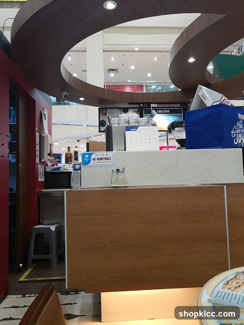 Counter area with menu board and seating