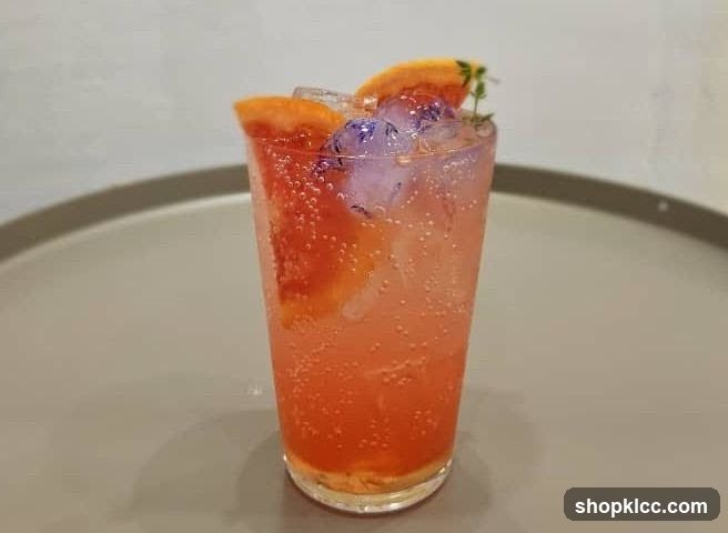 Ginger Punch with Orange Slices and Ice Cubes