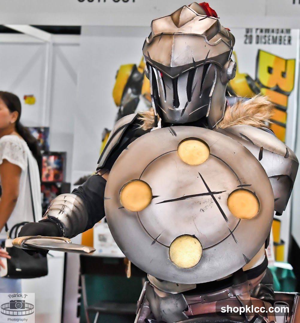 Cosplayer in Armor with Shield and Sword