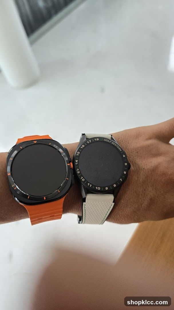 Two smartwatches on a wrist