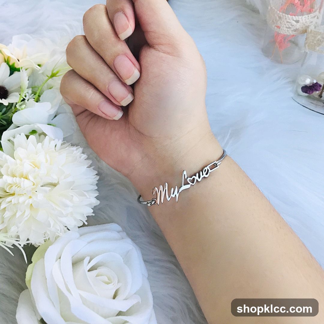 Hand with Bracelet and White Flowers