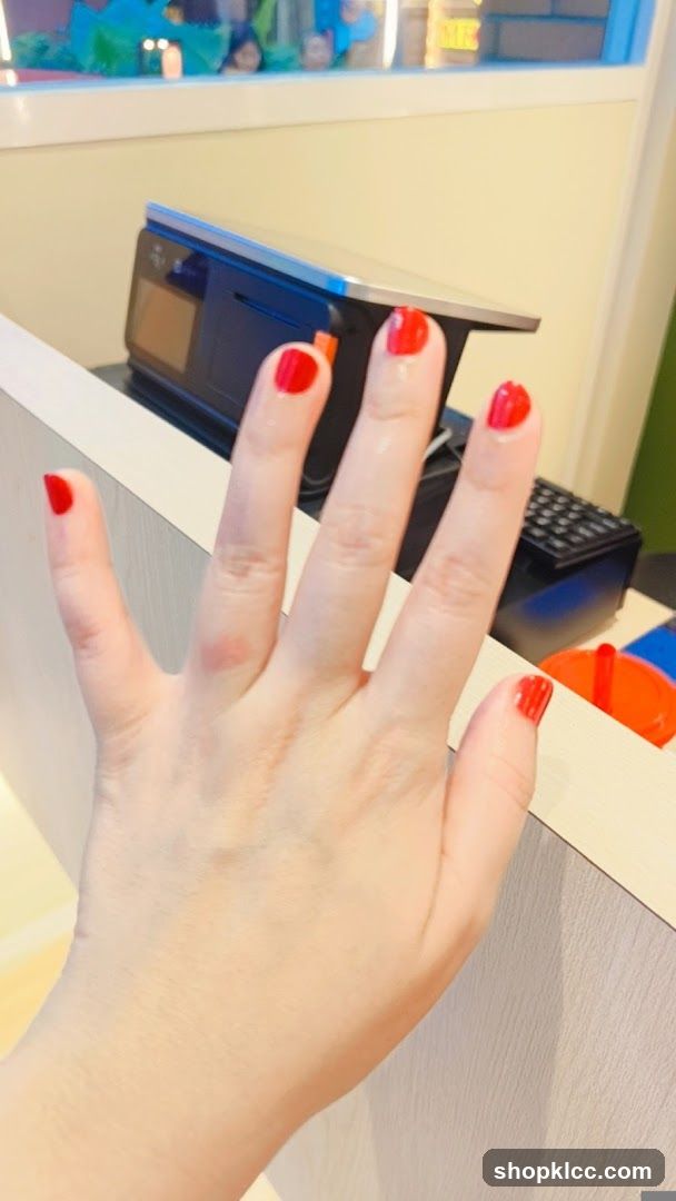 Hand with Red Nail Polish