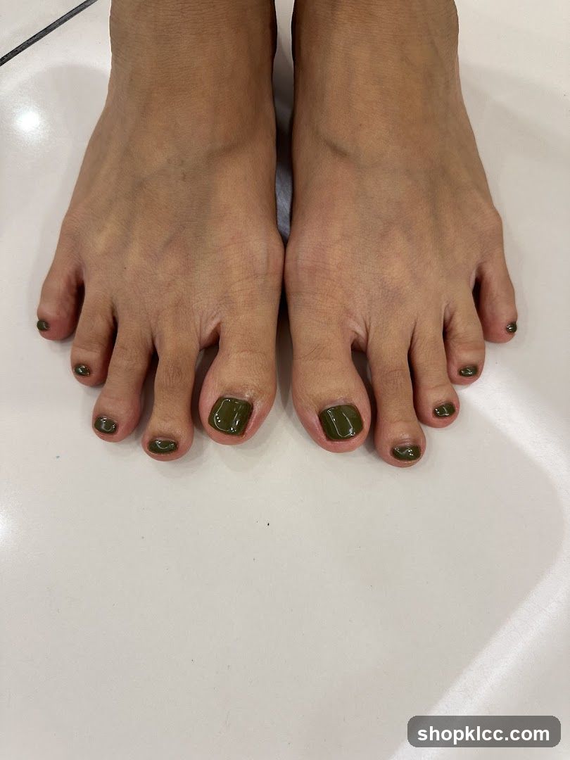 Toes with Green Nail Polish