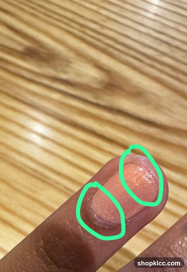 Close-up of a finger with makeup