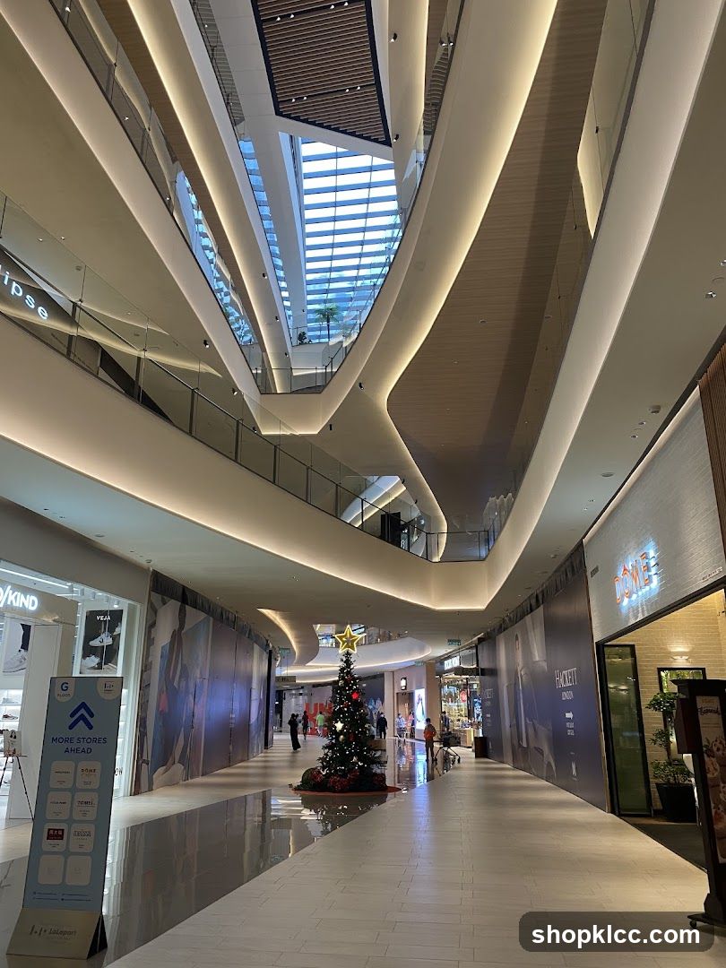 Modern Shopping Mall Interior with Christmas Tree