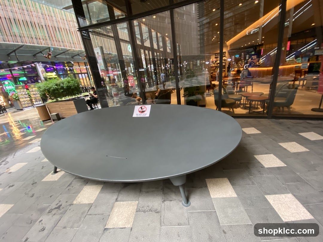 Outdoor seating area with a large circular table