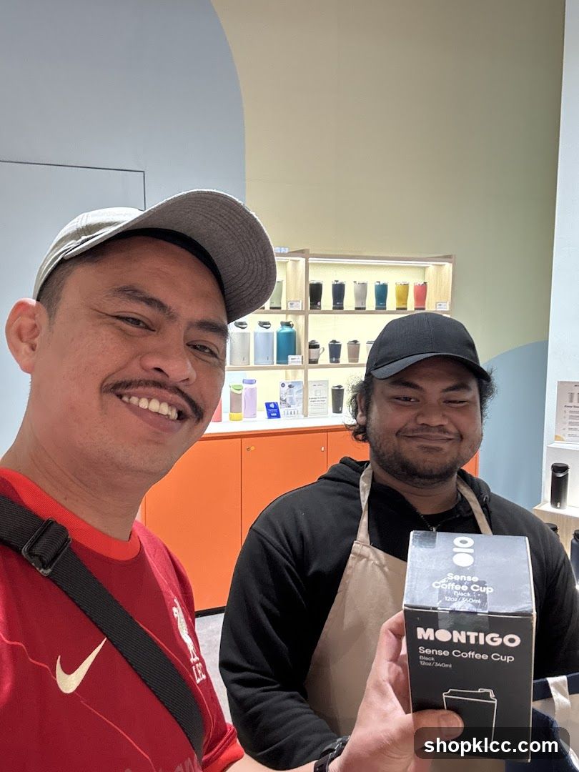 Two Men with a Montigo Coffee Cup
