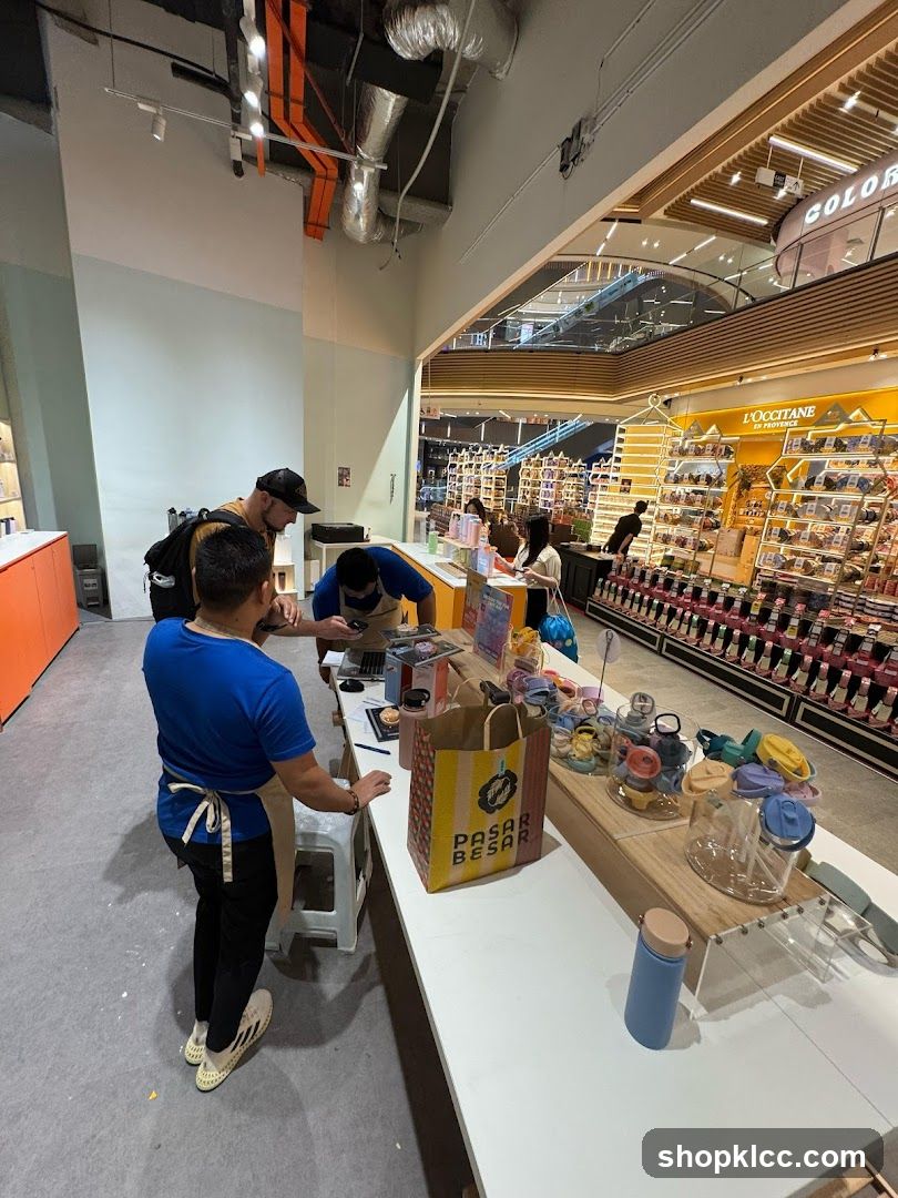 Retail store interior with staff and merchandise