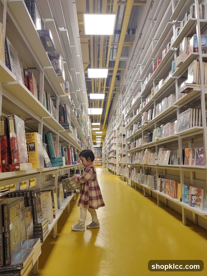 Child browsing books in a library
