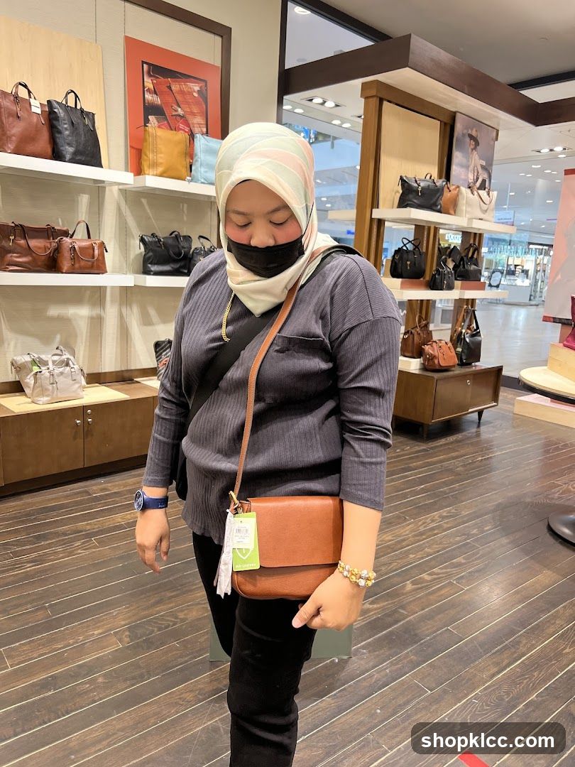 Woman with a brown crossbody bag
