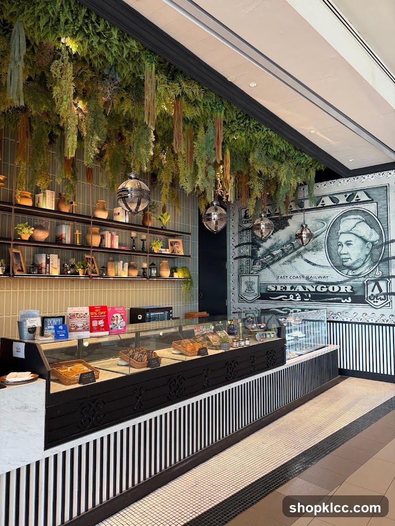 Cafe Interior with Hanging Plants and Display Counter