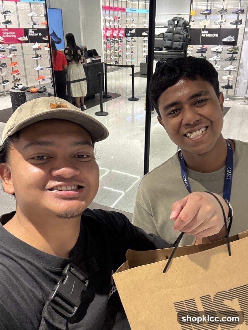 Two men smiling in a shoe store