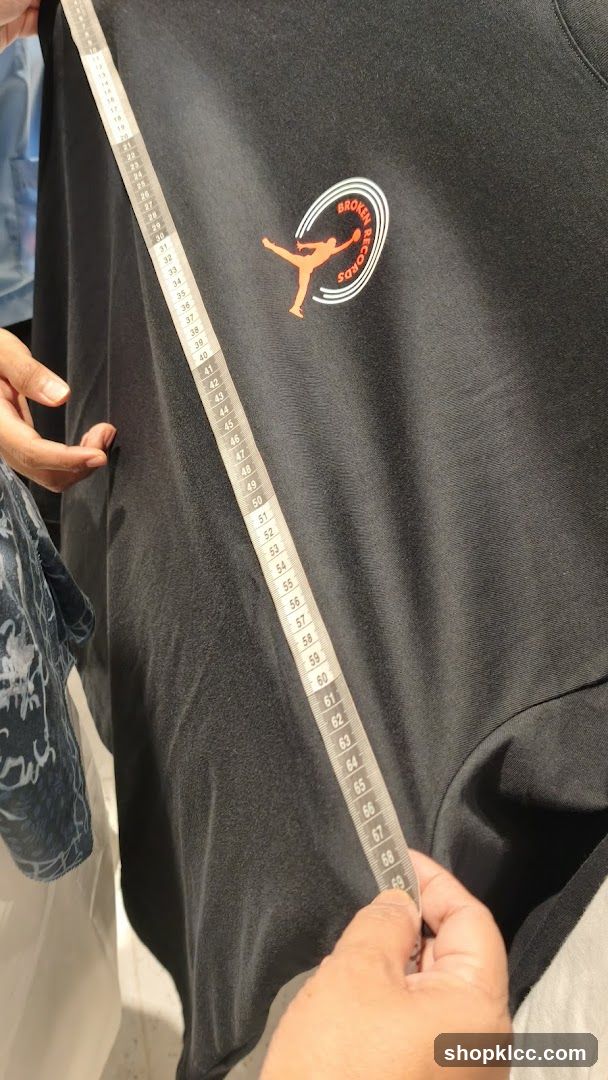 T-shirt with logo and measuring tape