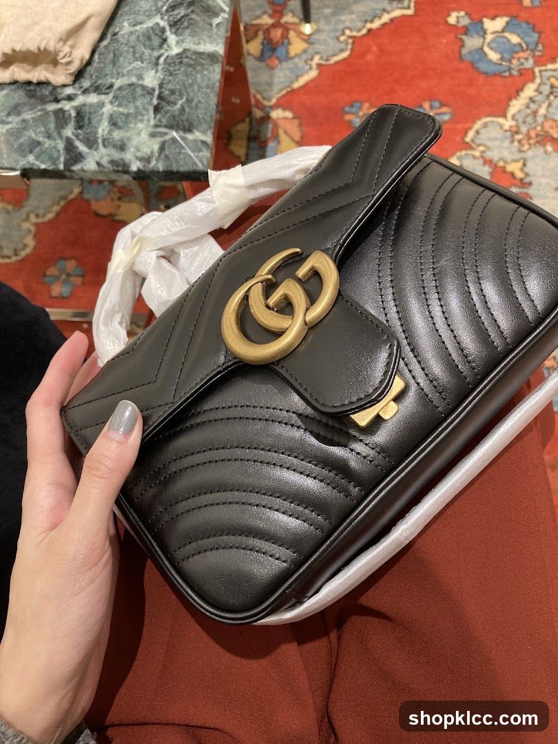 Black Quilted Leather Handbag with Gold GG Logo