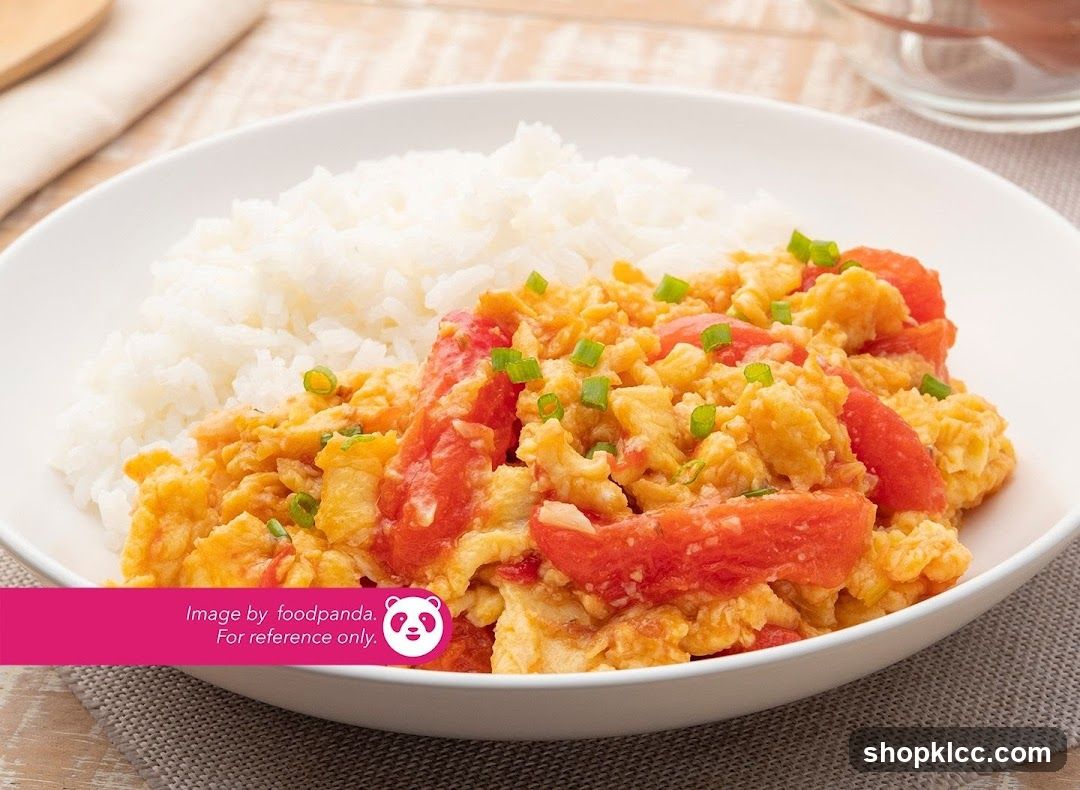Scrambled Eggs with Tomatoes and Rice