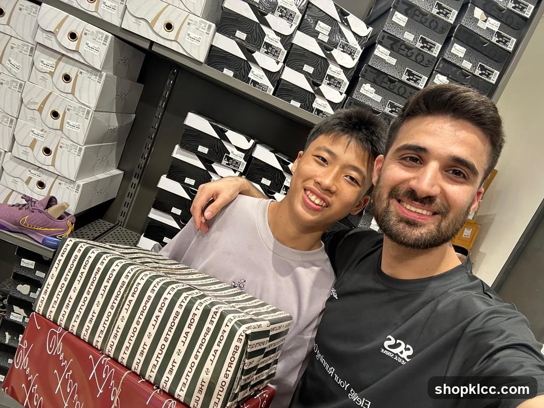 Two smiling people in a shoe store