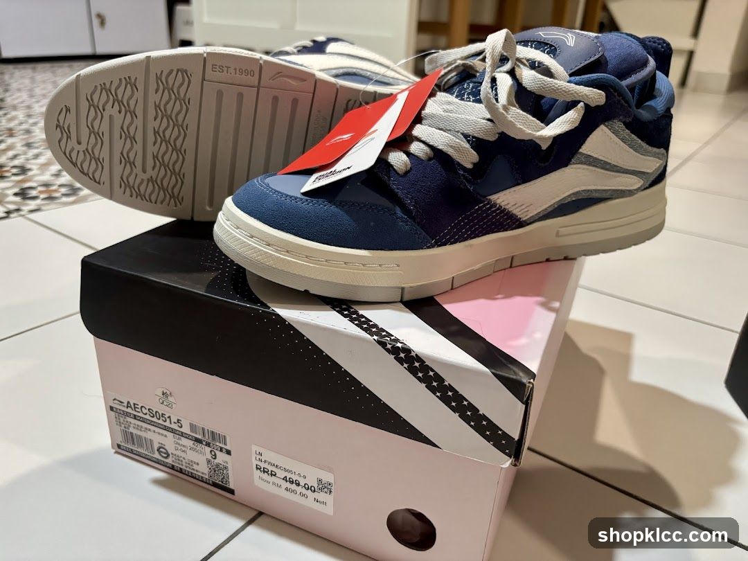 Blue and White Sneakers on a Box