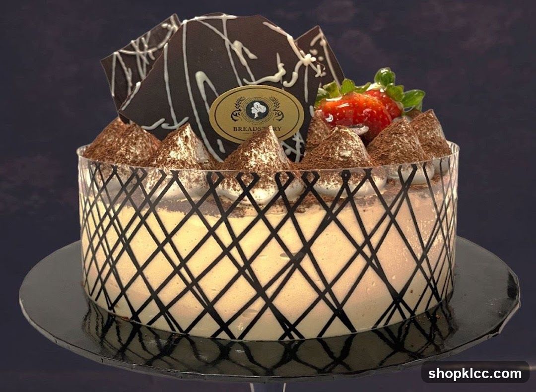 Decorated Cake with Chocolate Shavings and Strawberries