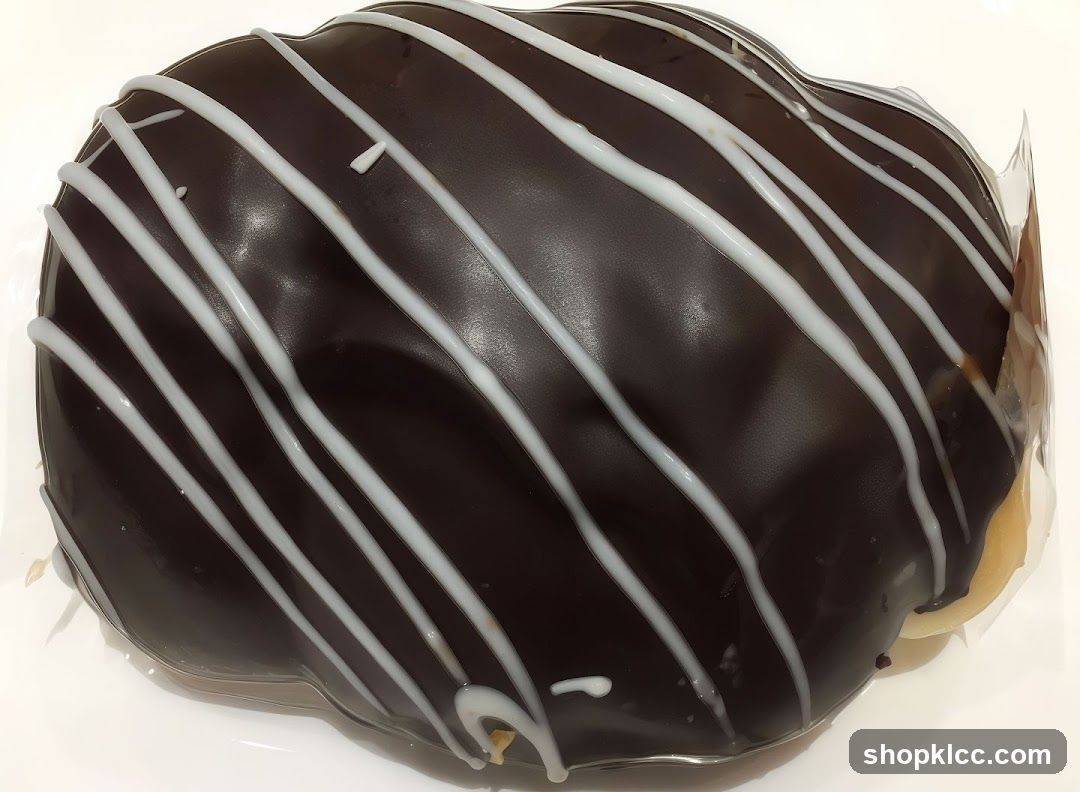 Chocolate Pastry with White Drizzle
