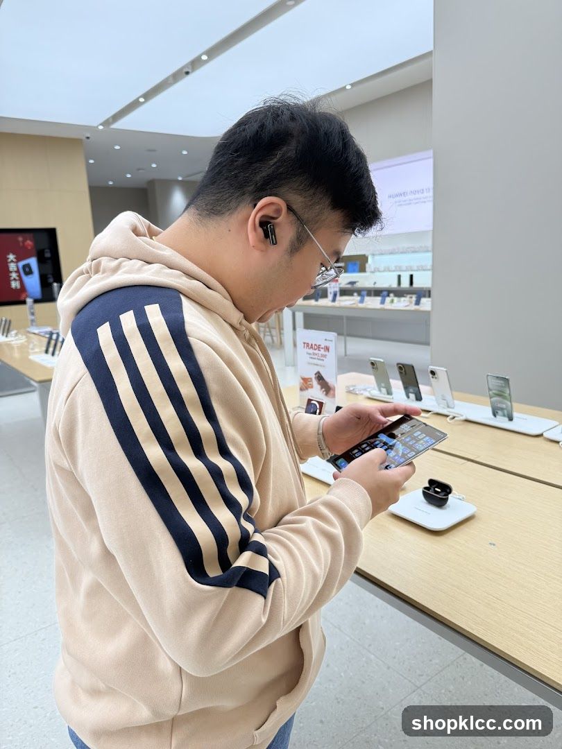 Man using a smartphone in a store