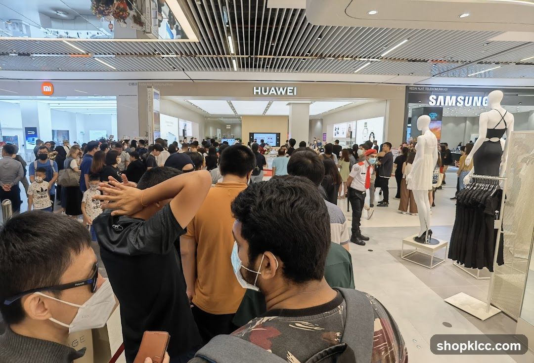 Crowd outside electronics stores