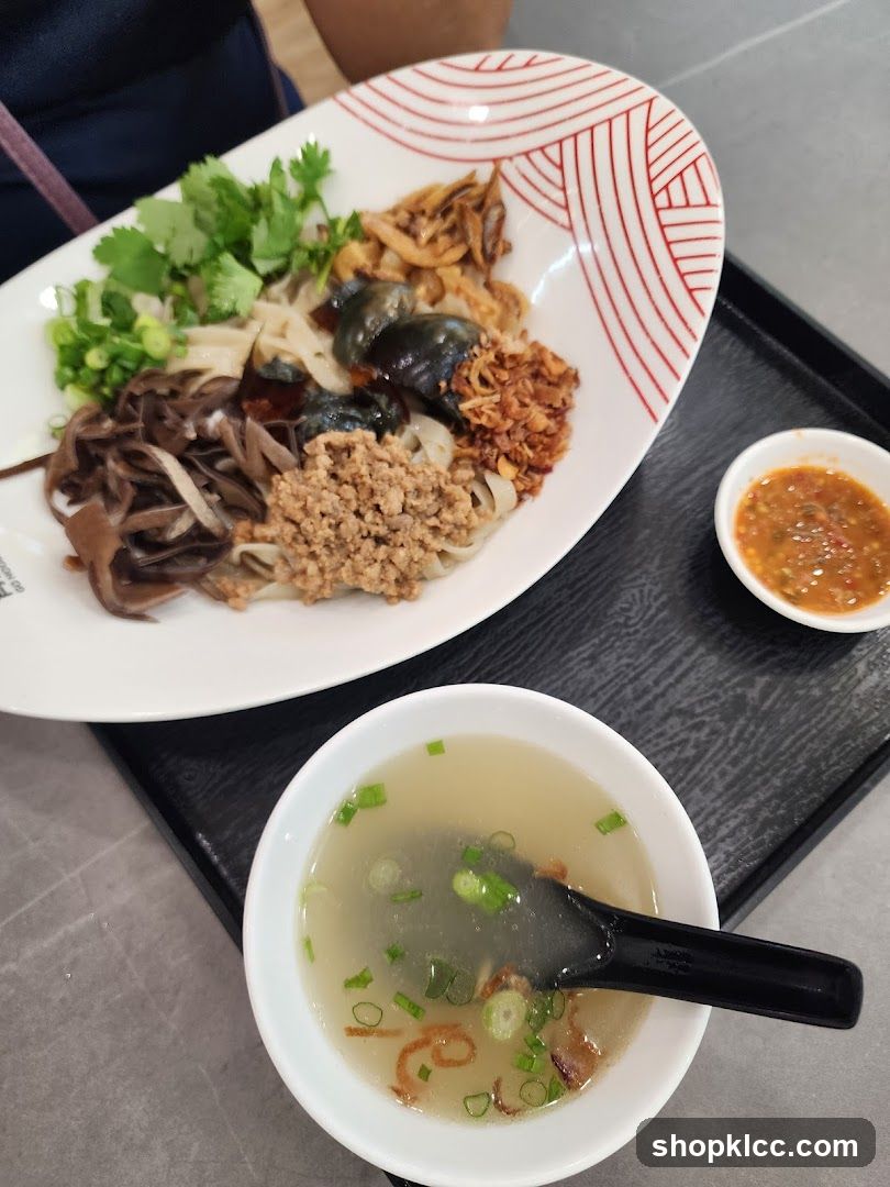 Noodles with Toppings and Soup