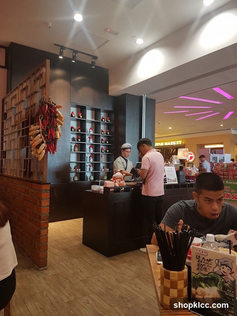 Restaurant Interior with Staff and Customers