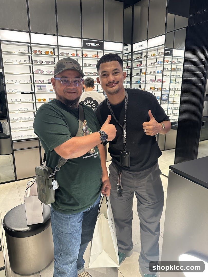 Two men posing in an eyewear store