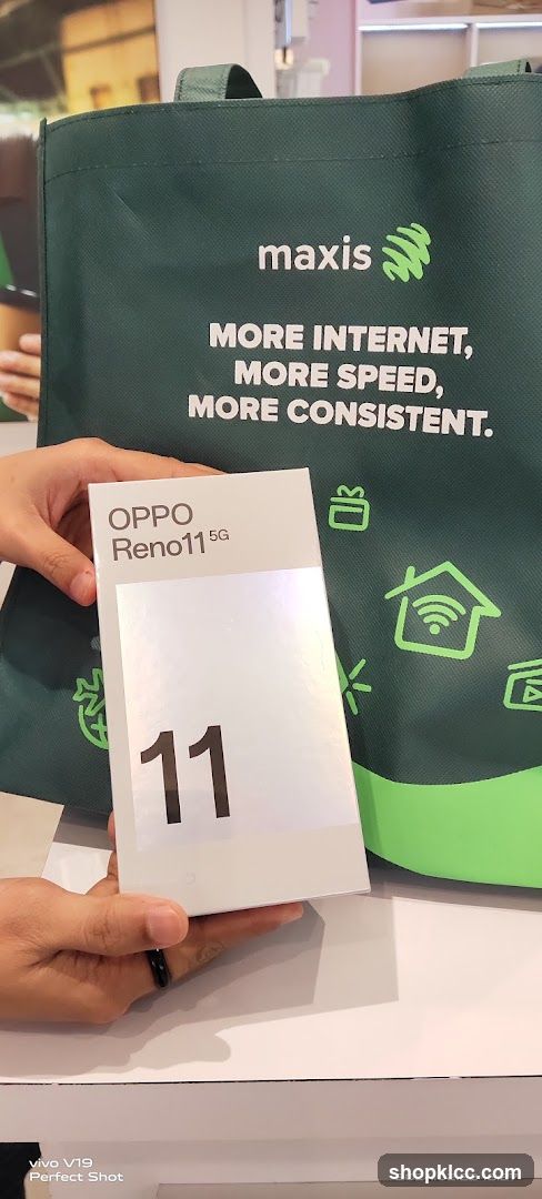 Maxis branded tote bag with OPPO Reno11 5G box