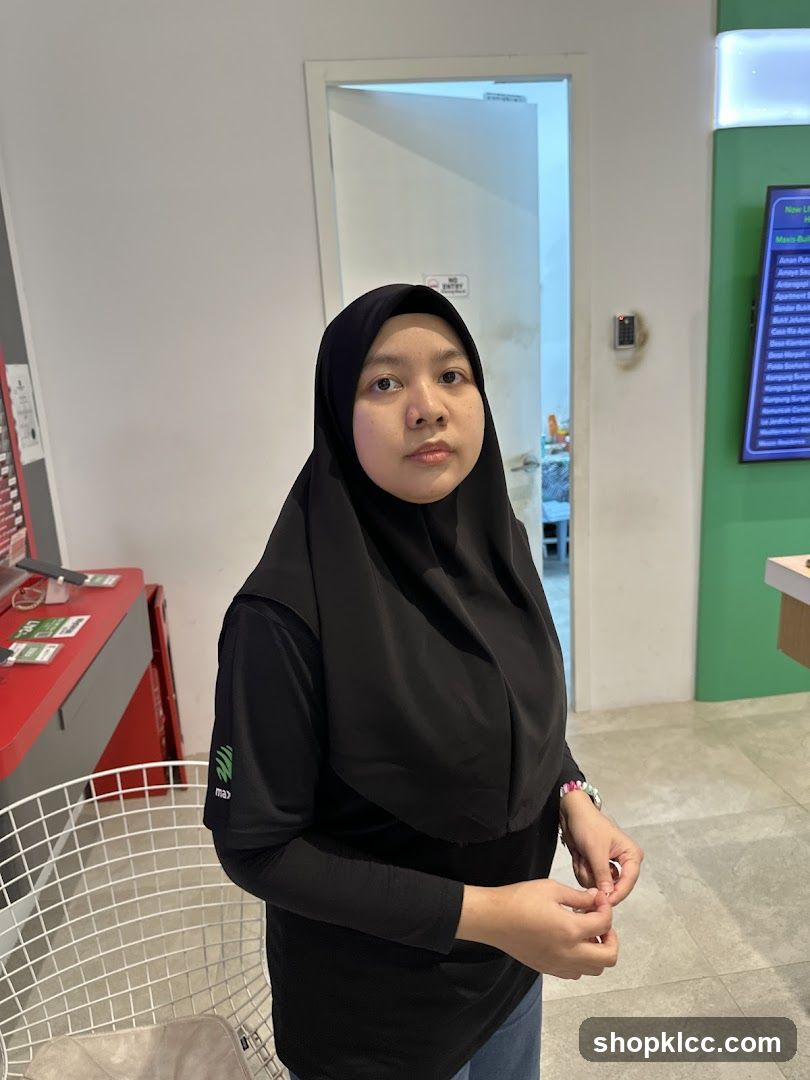 Woman in black hijab and shirt