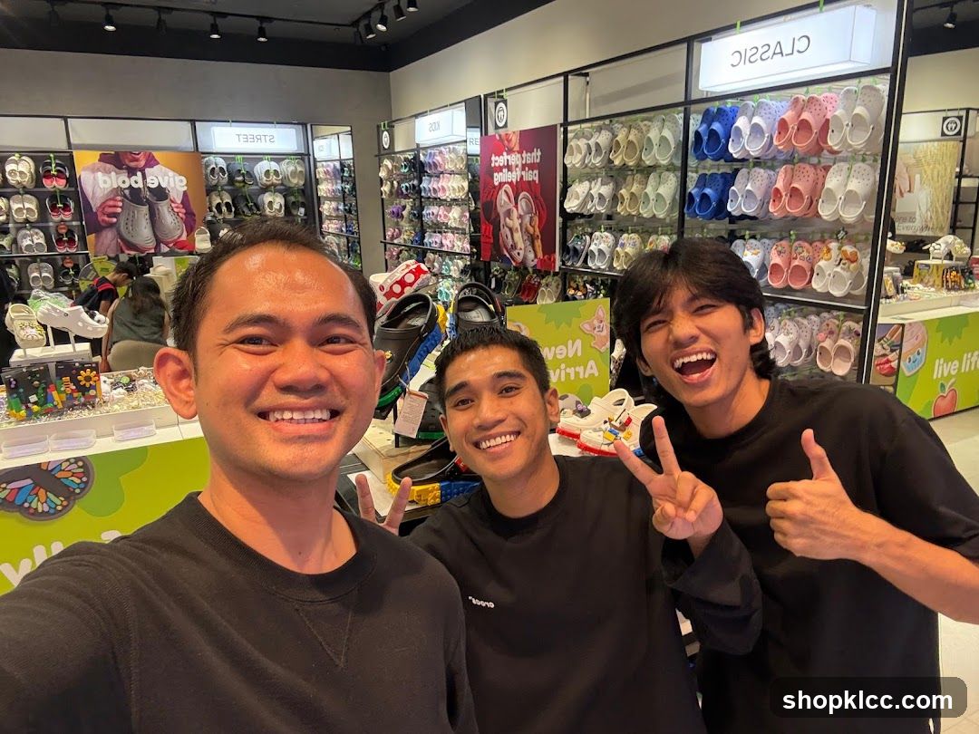 Three men smiling in a shoe store