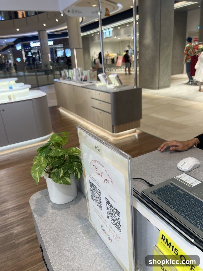 Store counter with QR codes and promotional sign