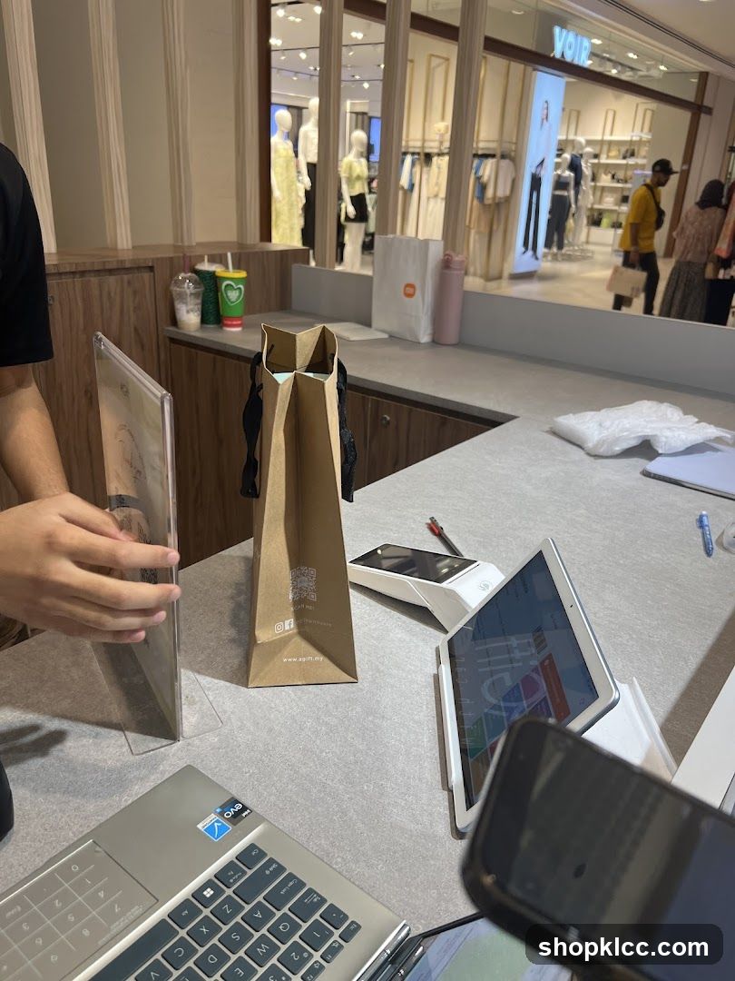 Checkout Counter with Shopping Bag and Electronics
