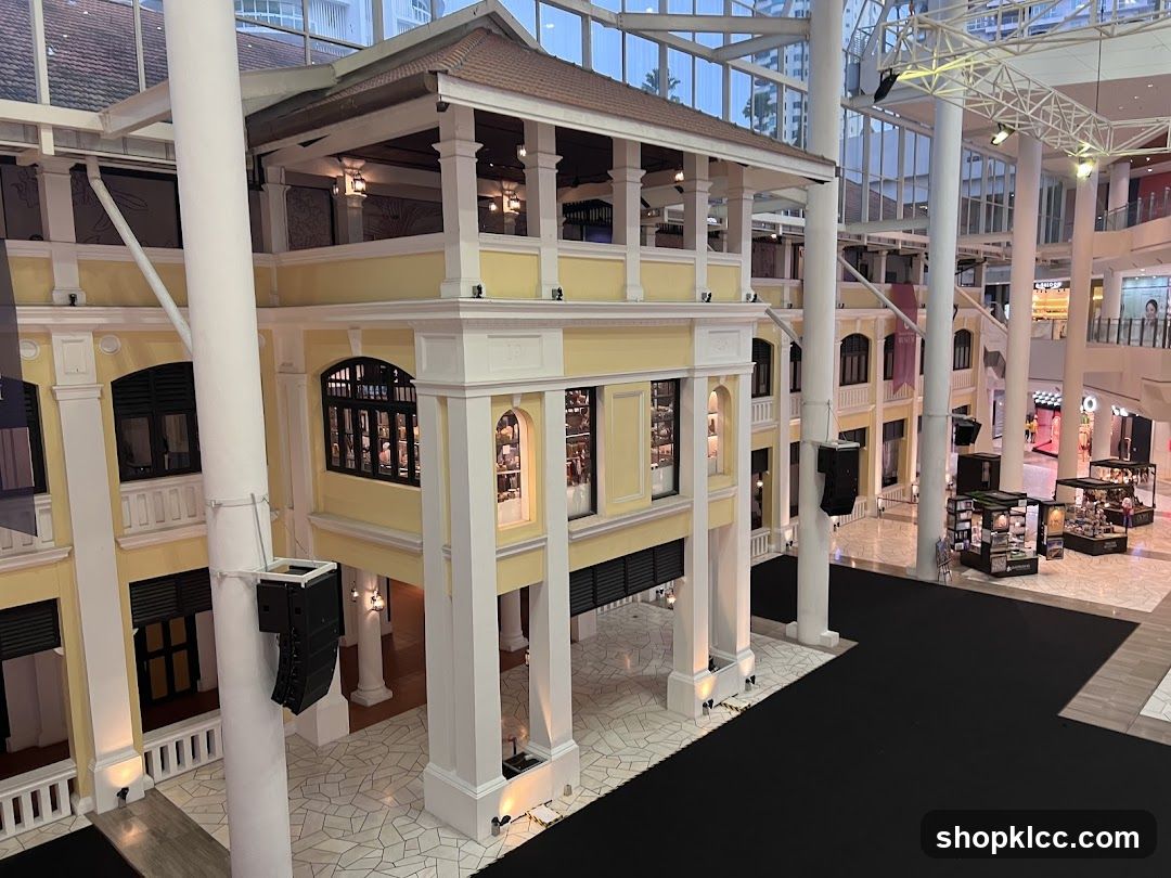 Interior of a shopping mall with a traditional-style building facade