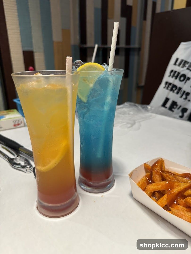 Colorful Drinks and Fries at a Restaurant