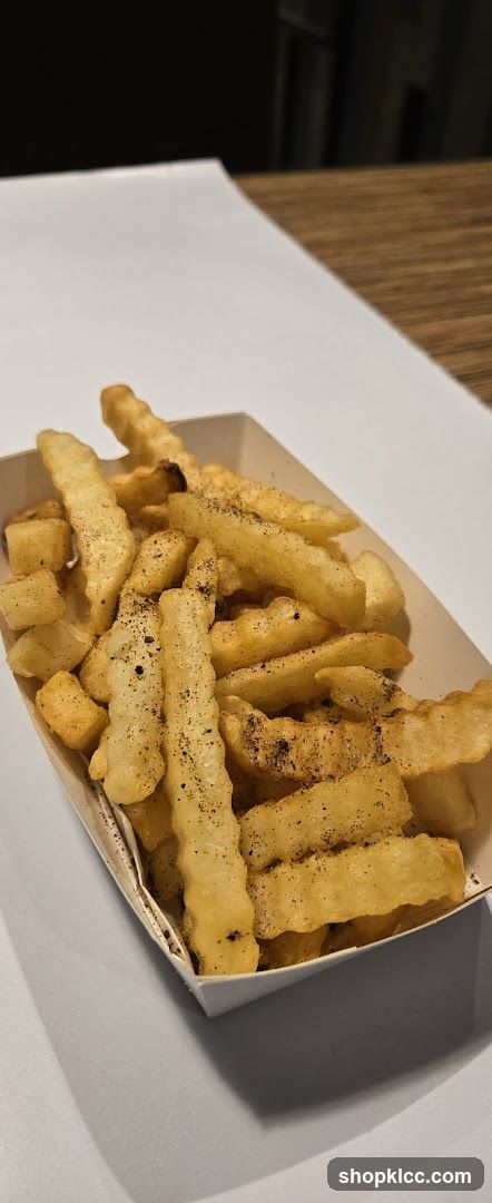 Seasoned Fries in Paper Container