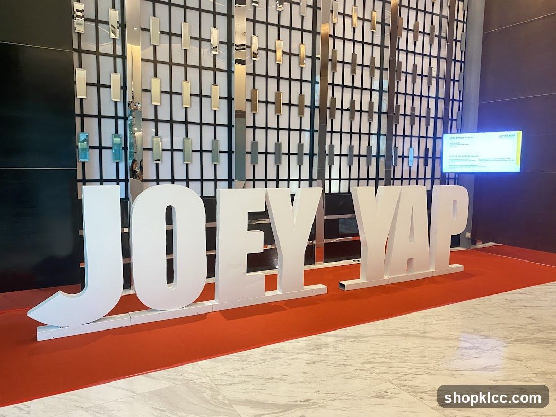 Large White Letters Spelling "JOEY YAP"