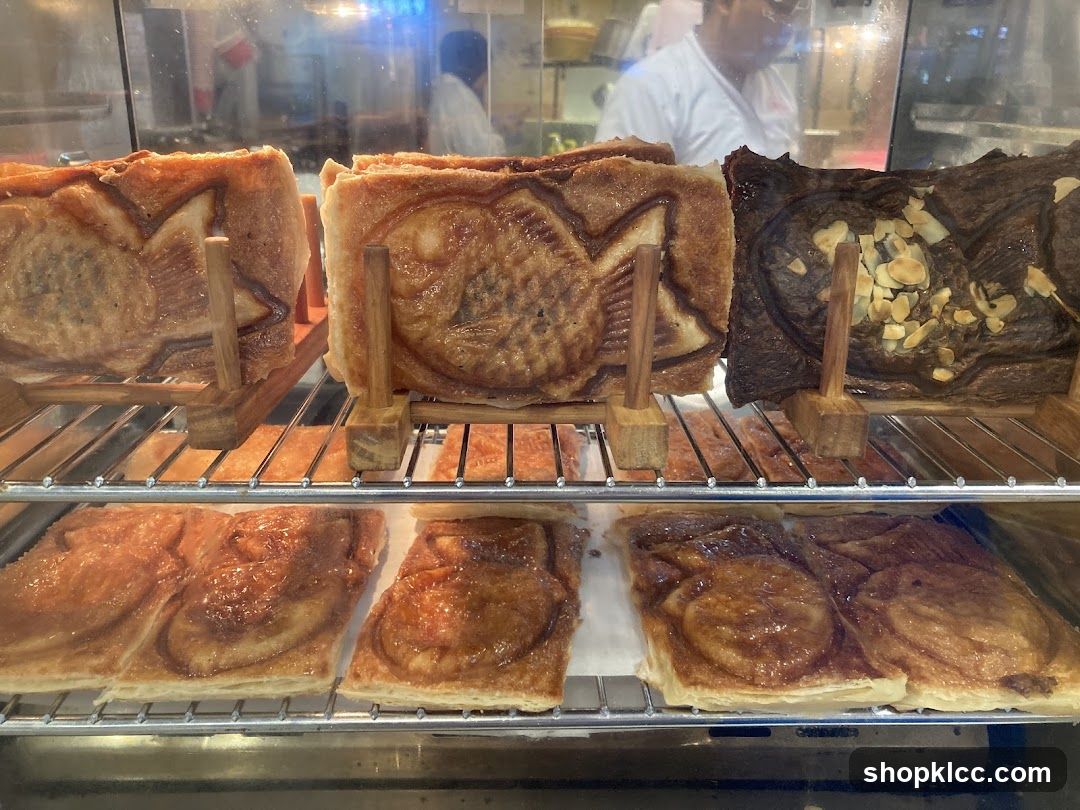Fish-shaped pastries in a display case