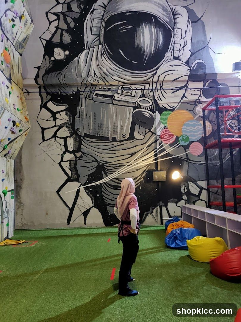 Indoor Climbing Gym with Astronaut Mural