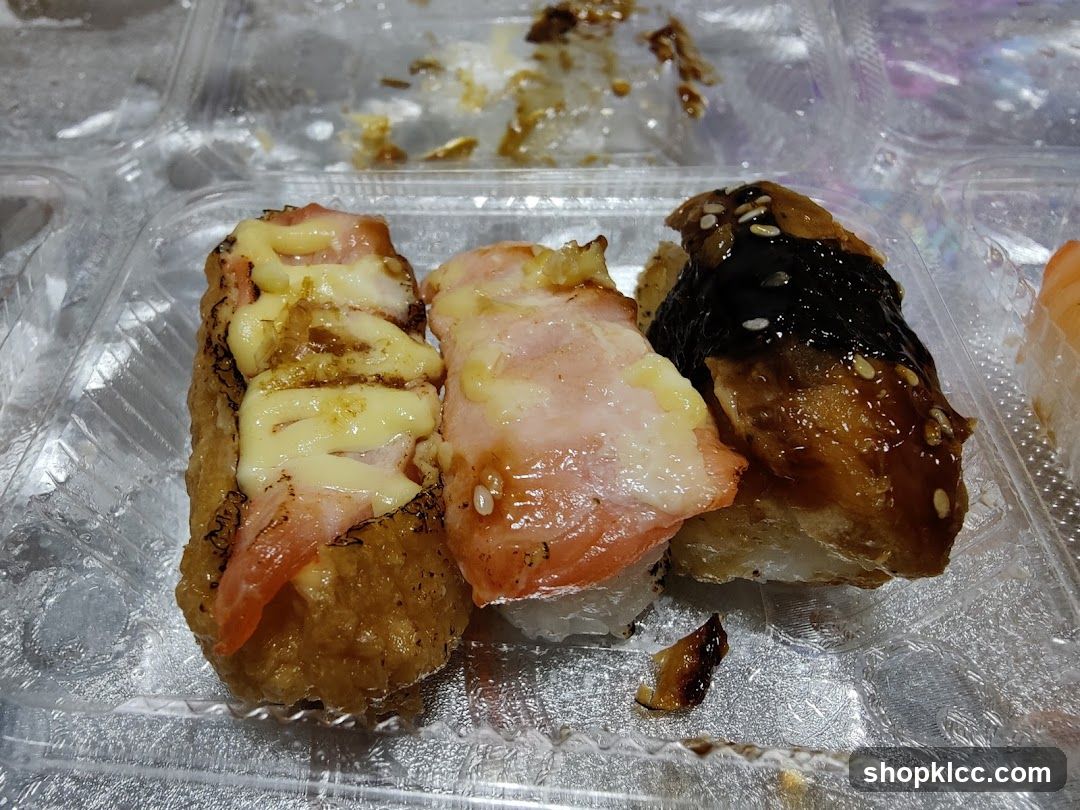 Sushi in a plastic container