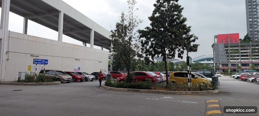 Parking Lot with Buildings and Cars