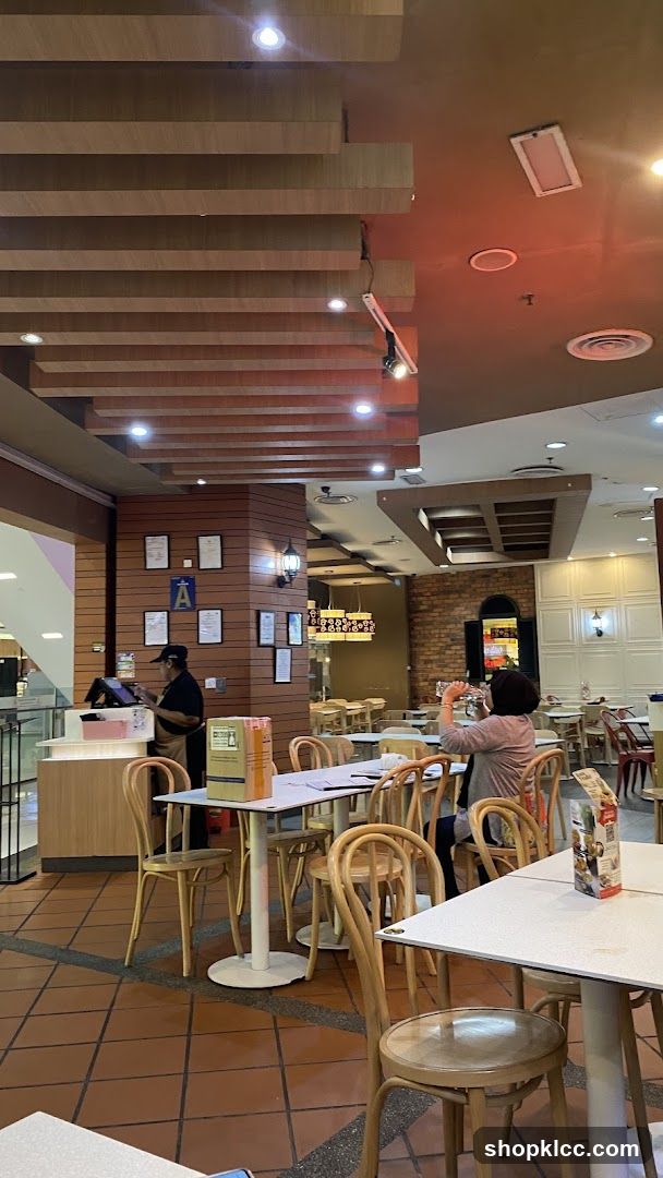 Restaurant Interior with Seating and Staff