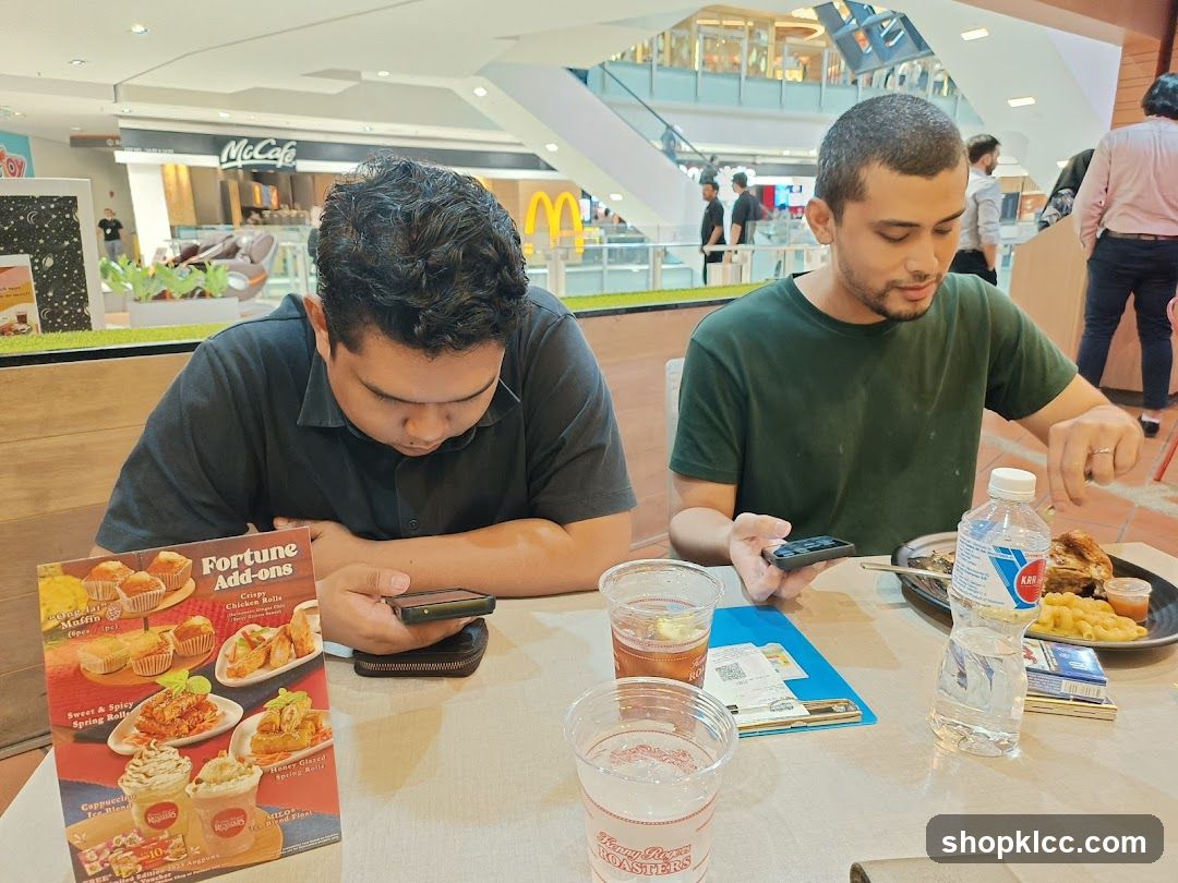 People eating at a food court
