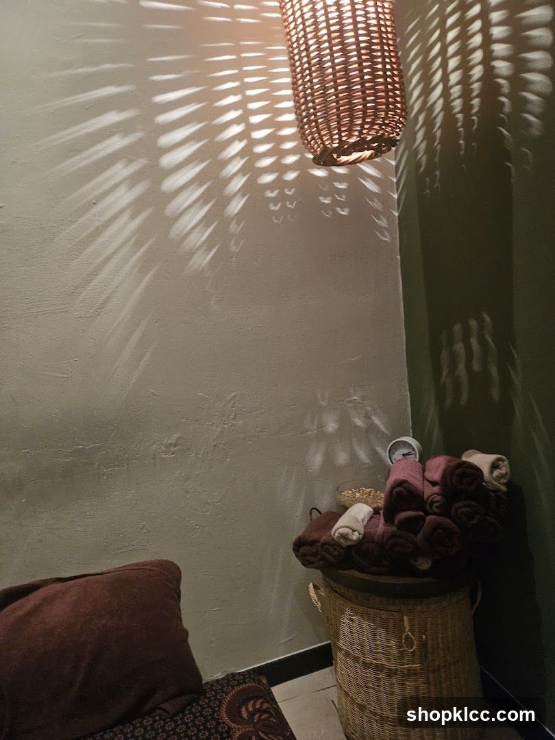 Spa Interior with Woven Lamp and Rolled Towels