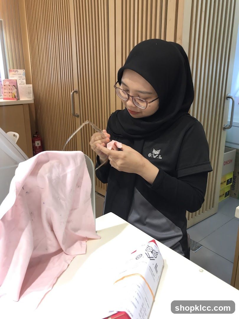 Woman cleaning eyeglasses