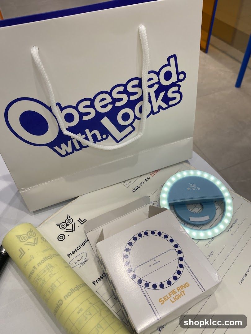 Obsessed with Looks shopping bag and selfie ring light