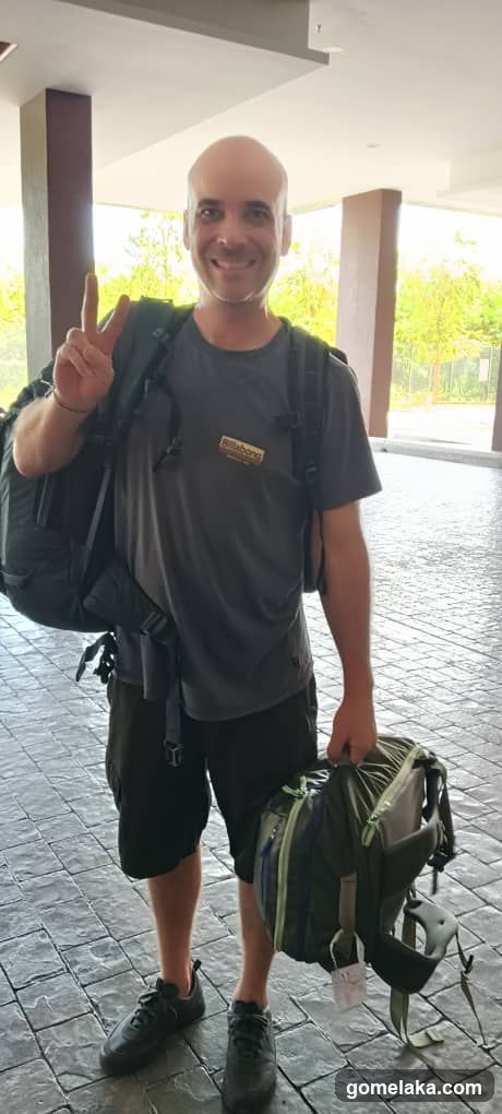 Traveler at building entrance